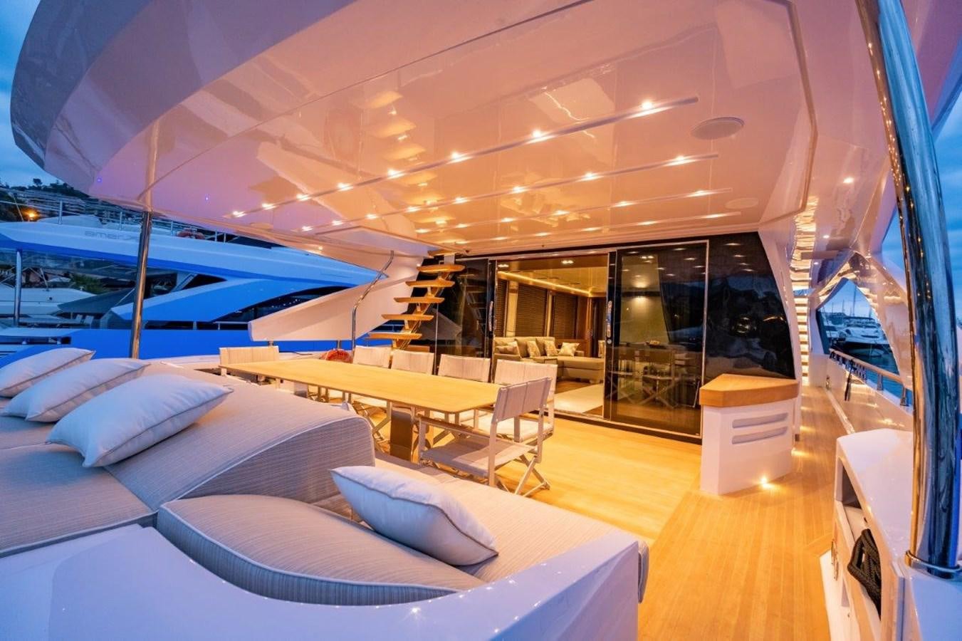 a room with a large bed and a large open roof aboard BACCARAT Yacht for Sale