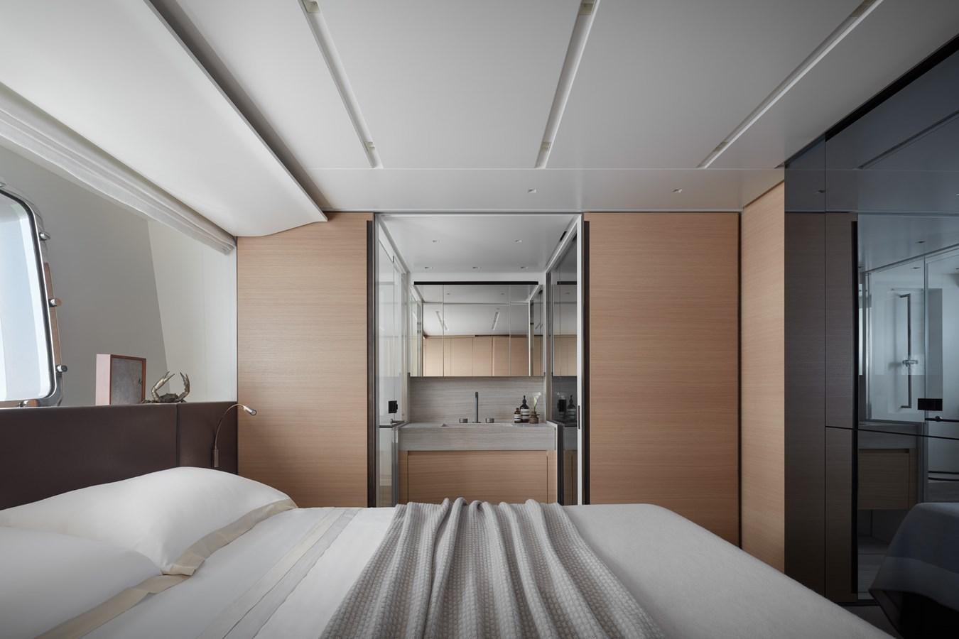 a room with a bed and a ladder aboard STRADODO Yacht for Sale