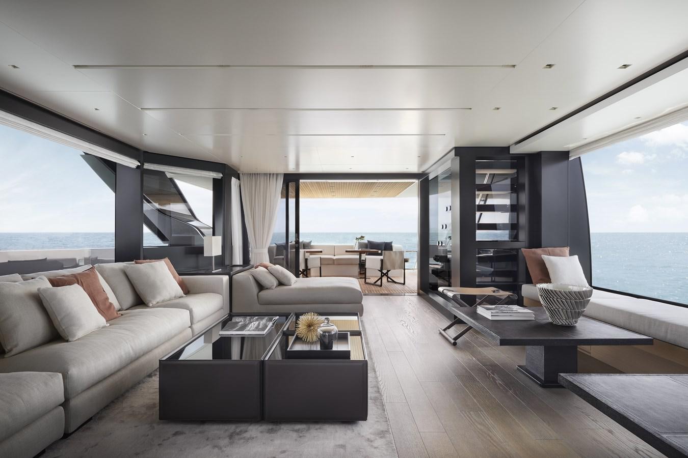 a living room with a large window aboard STRADODO Yacht for Sale