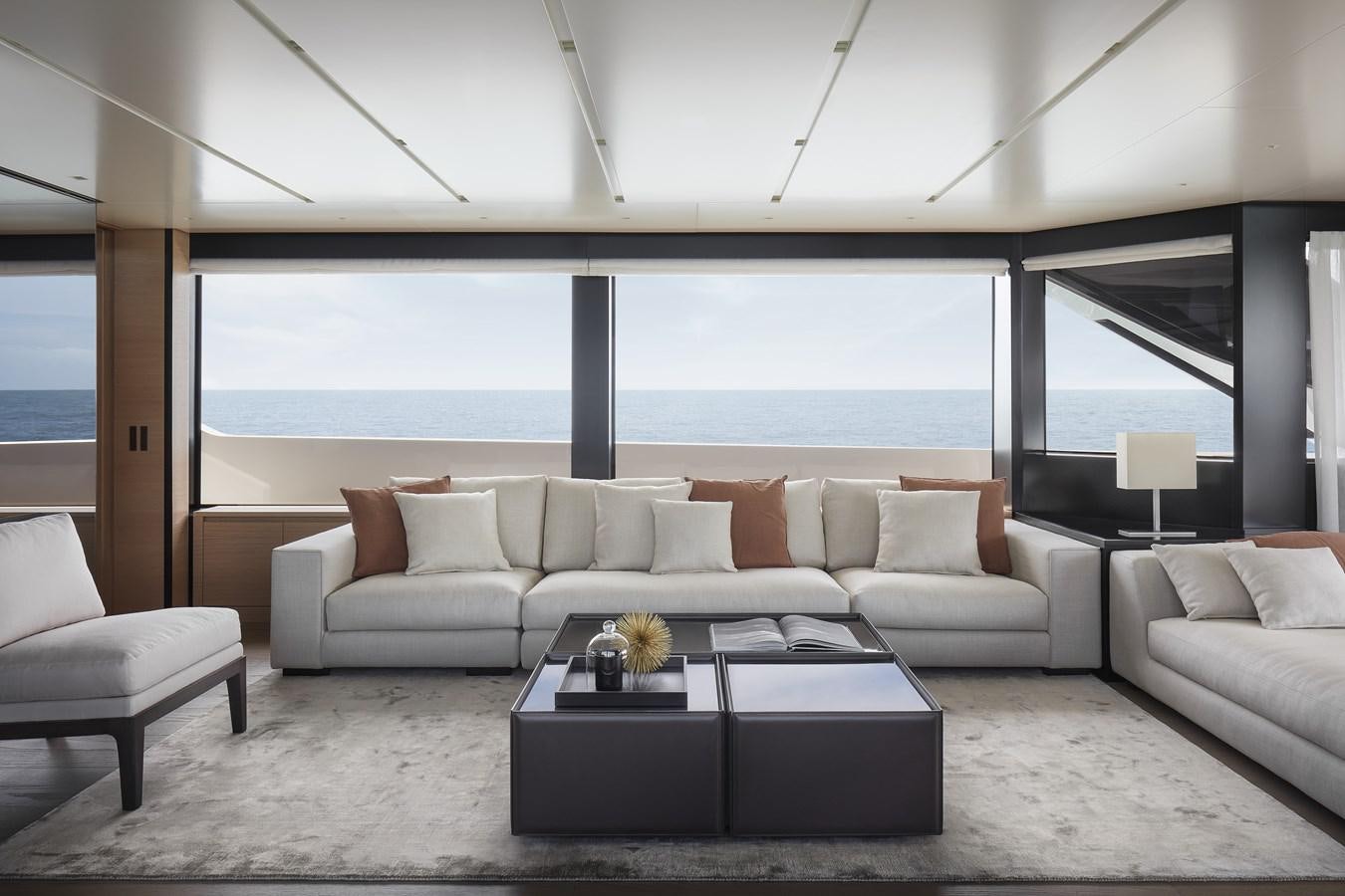 a living room with a large window aboard STRADODO Yacht for Sale