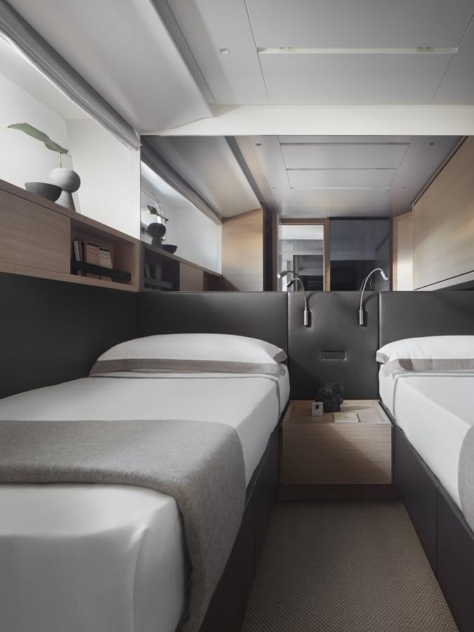 a room with a row of seats aboard STRADODO Yacht for Sale