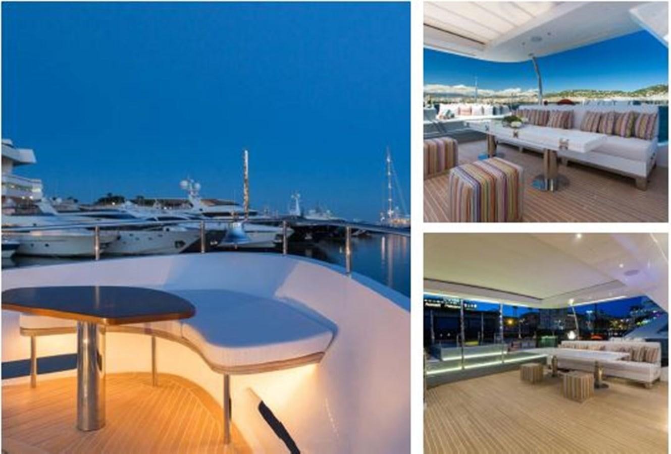 a room with a table and chairs aboard GALA Yacht for Sale