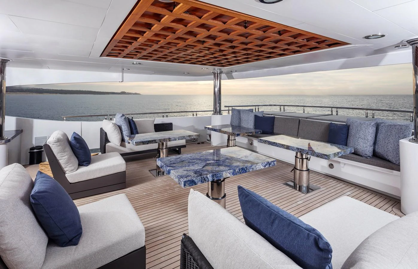 a large living room with a large open roof aboard CHAMPAGNE SEAS Yacht for Sale