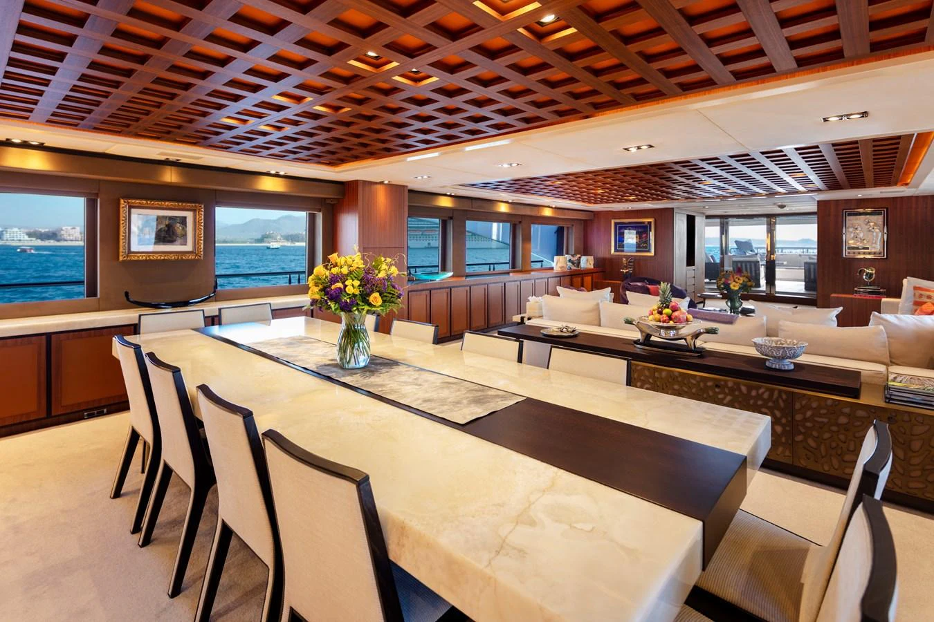 a room with tables and chairs aboard CHAMPAGNE SEAS Yacht for Sale