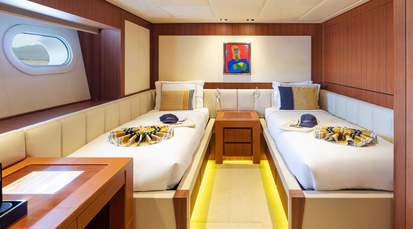 a room with a couple beds aboard CHAMPAGNE SEAS Yacht for Sale