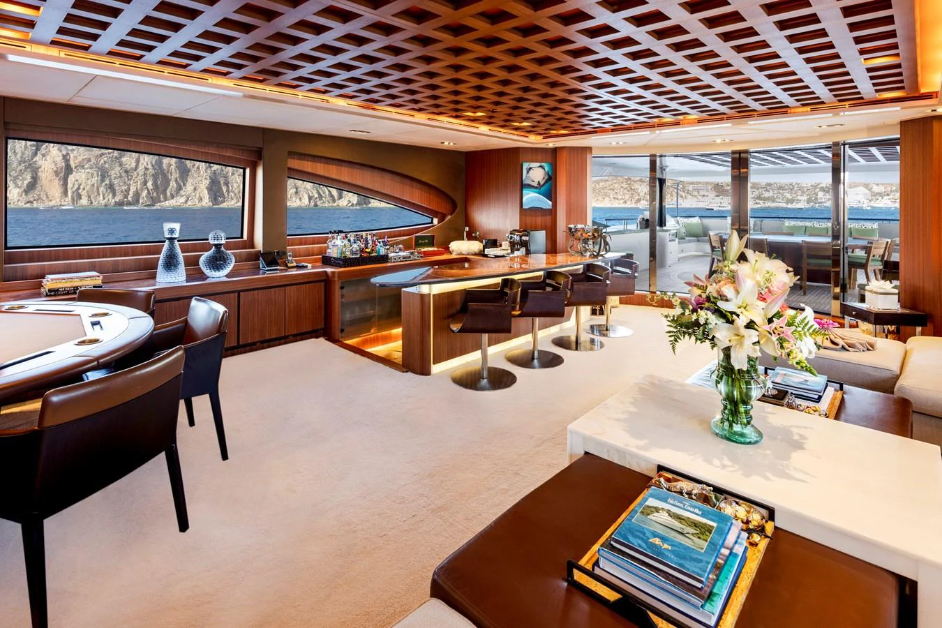 a room with tables and chairs aboard CHAMPAGNE SEAS Yacht for Sale