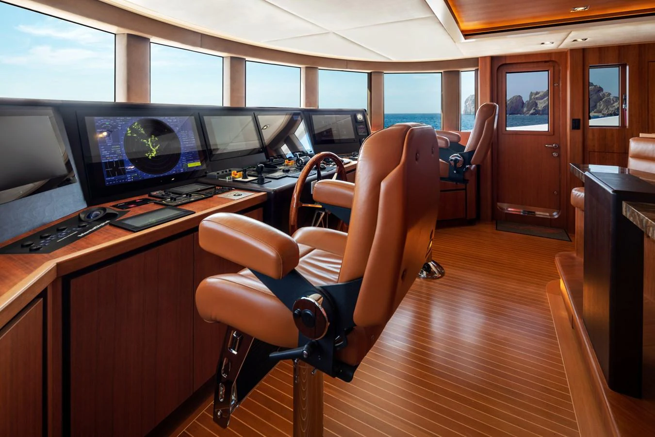 a room with computers and chairs aboard CHAMPAGNE SEAS Yacht for Sale