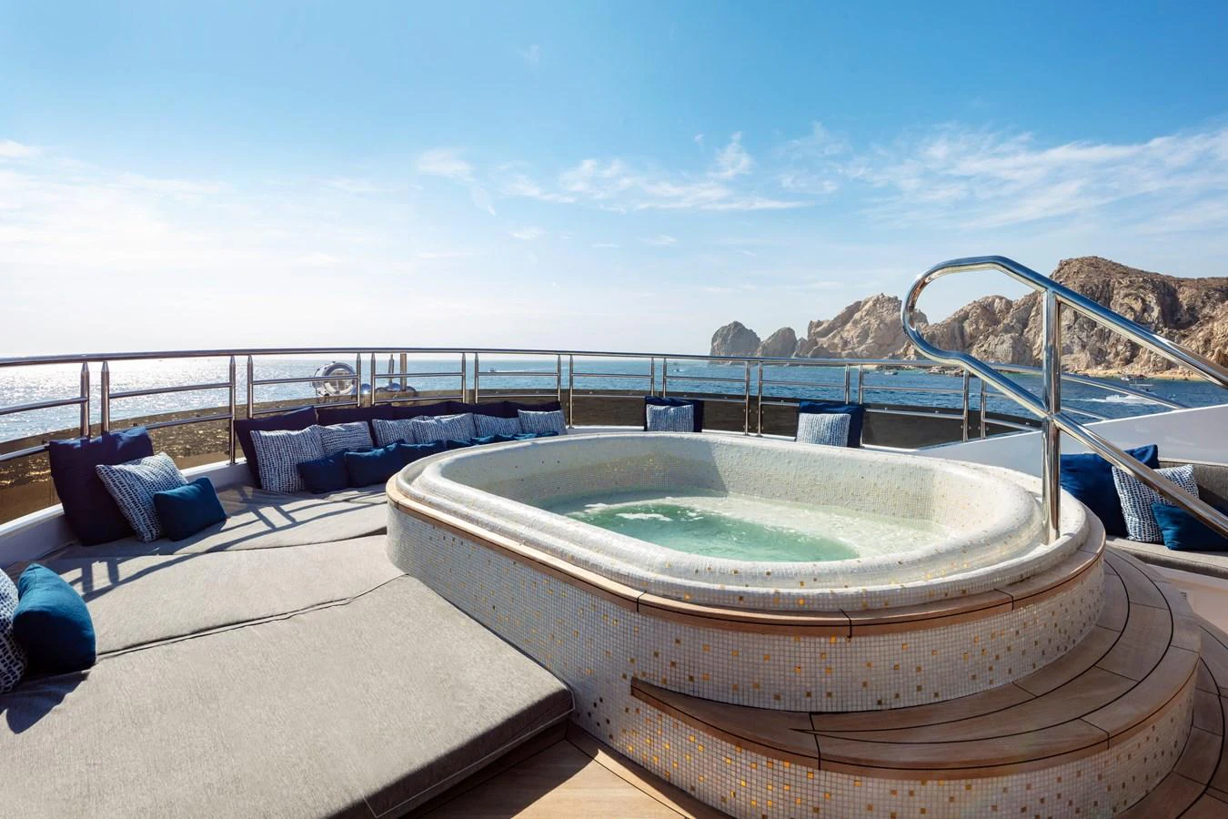 a swimming pool on a deck aboard CHAMPAGNE SEAS Yacht for Sale