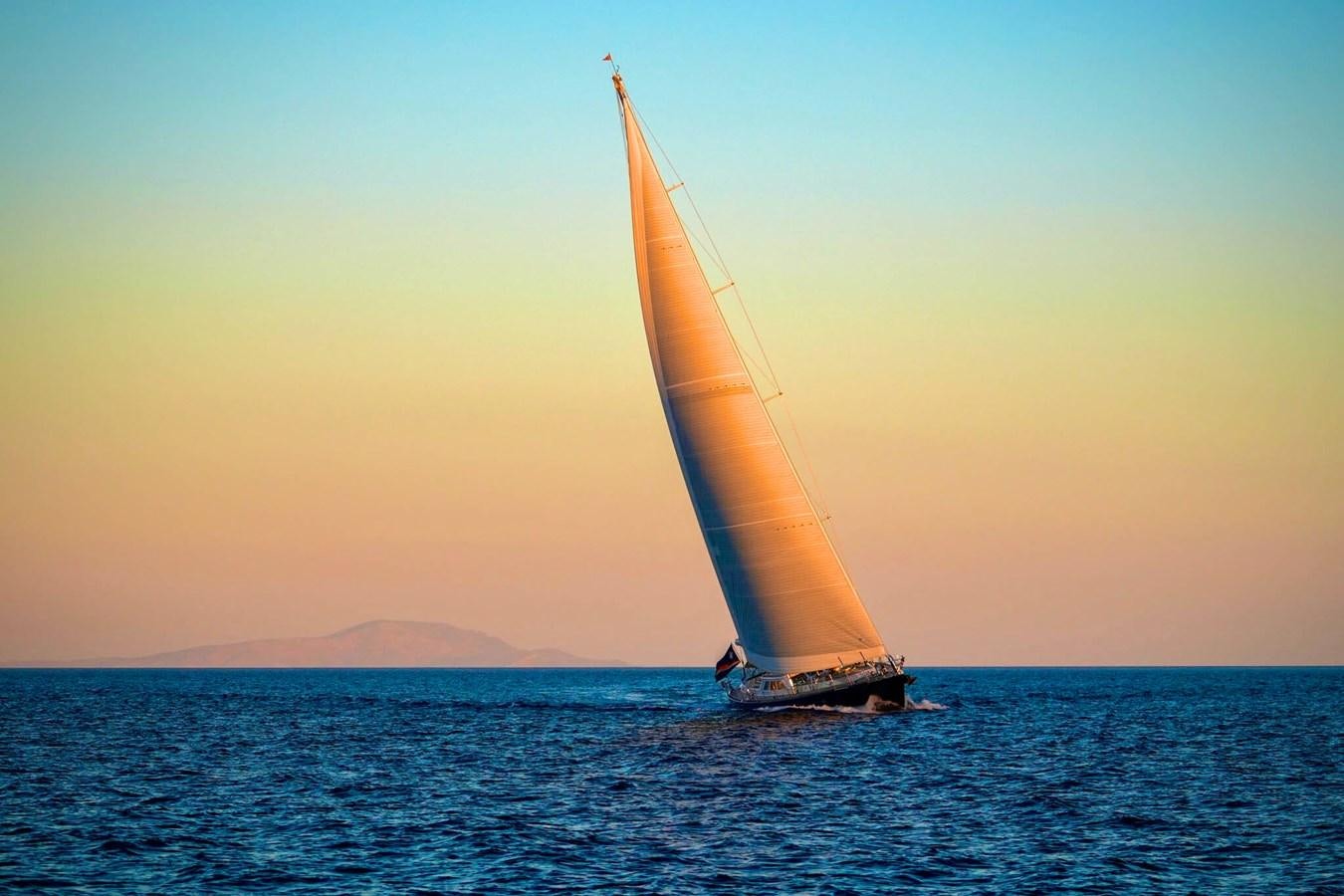 a sailboat in the water aboard IKARON Yacht for Sale