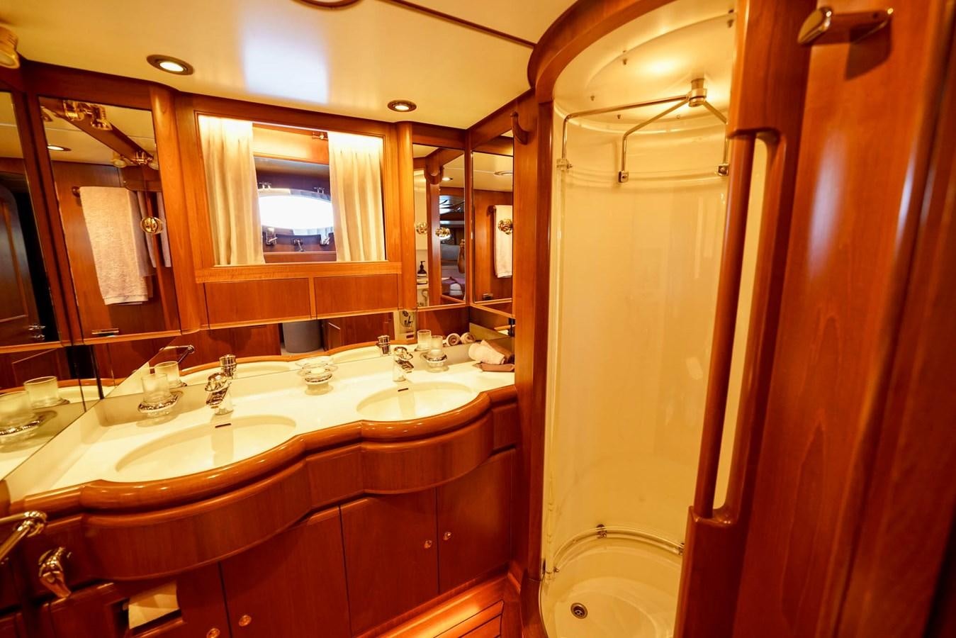 a bathroom with a large mirror aboard IKARON Yacht for Sale