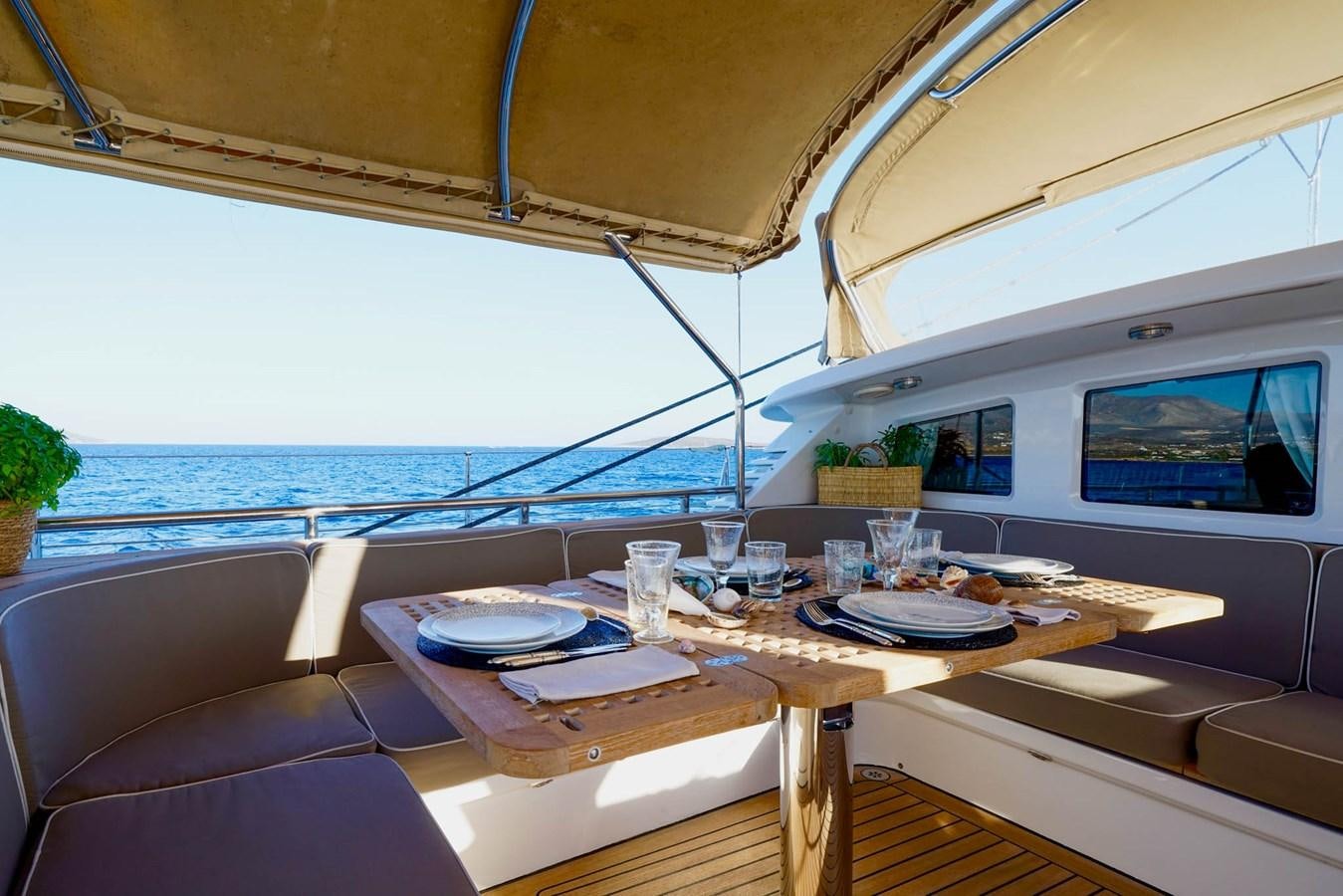 a table on a boat aboard IKARON Yacht for Sale