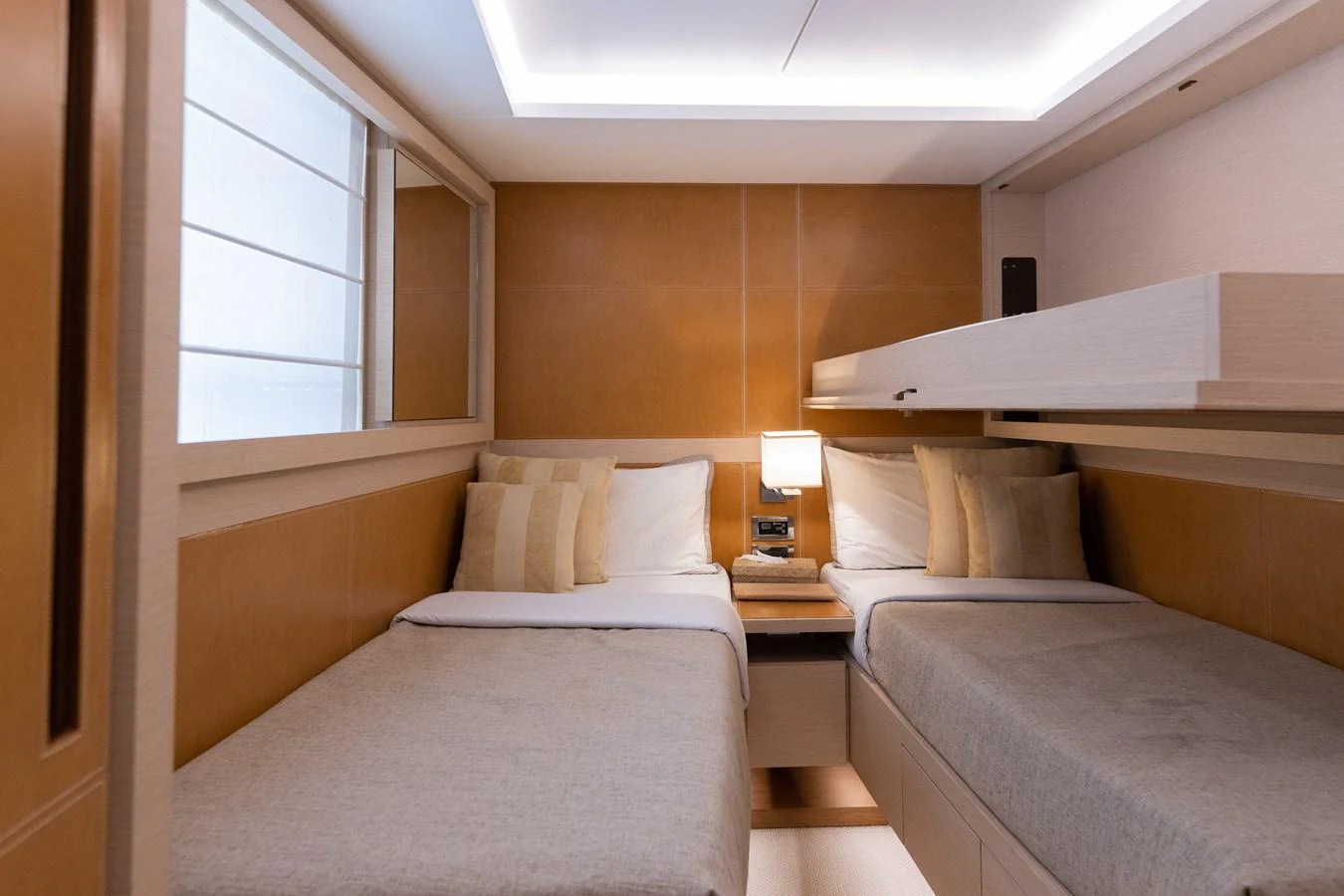 a room with two beds aboard LIBERTY CALL Yacht for Sale