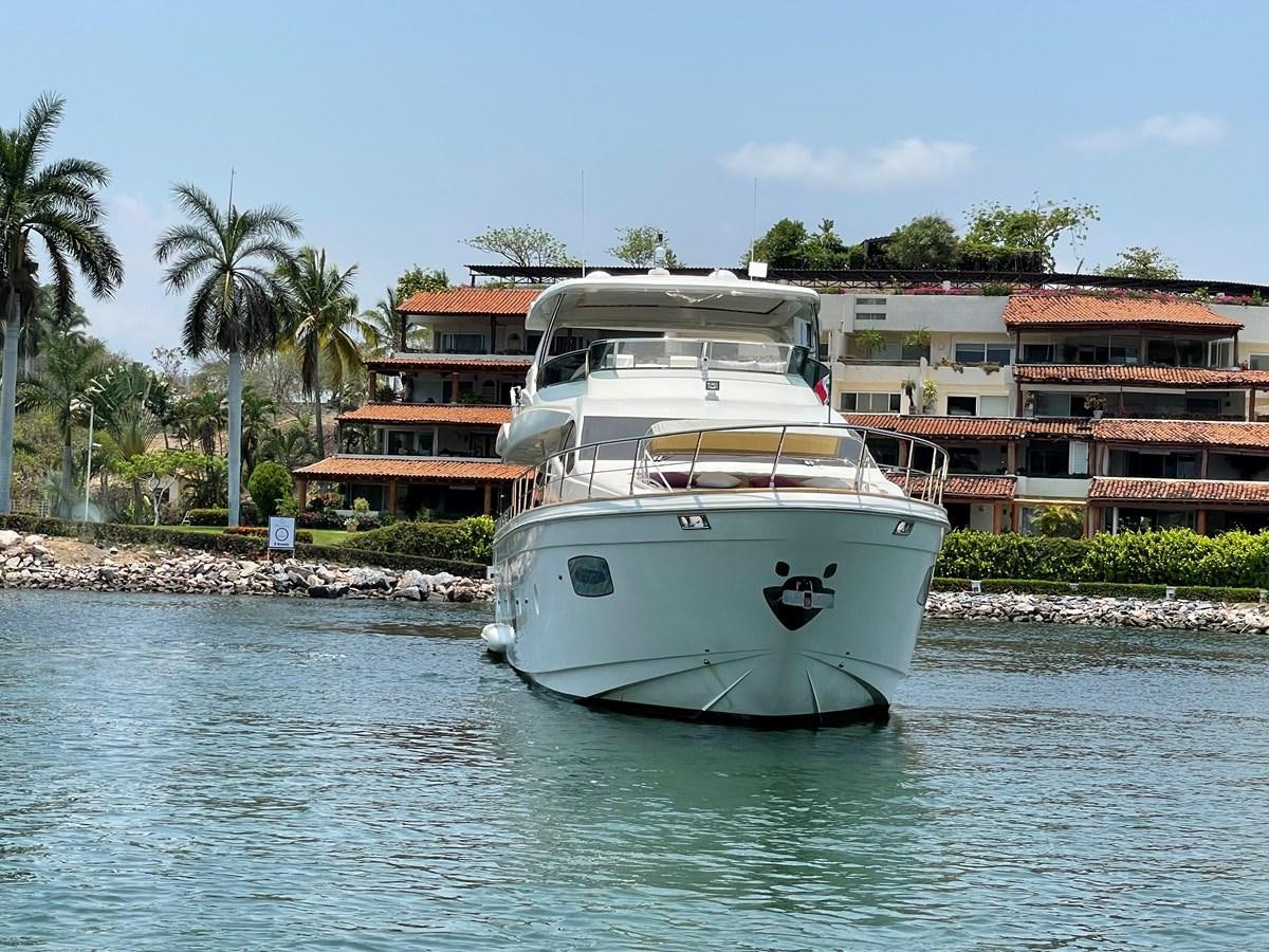 a white boat in the water aboard 2008 AZIMUT 75 FLY @ IXTAPA ZIHUATANEJO Yacht for Sale