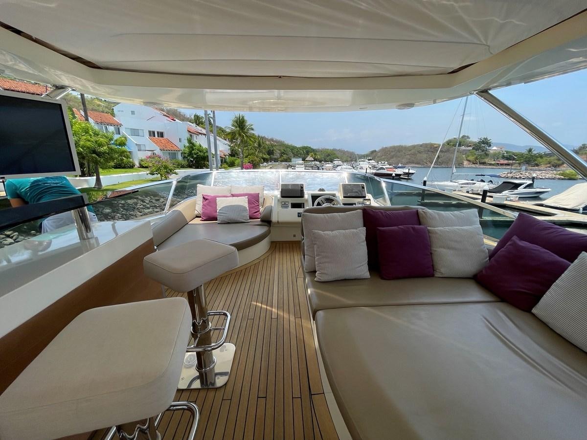 a room with a view of the city and the water aboard 2008 AZIMUT 75 FLY @ IXTAPA ZIHUATANEJO Yacht for Sale