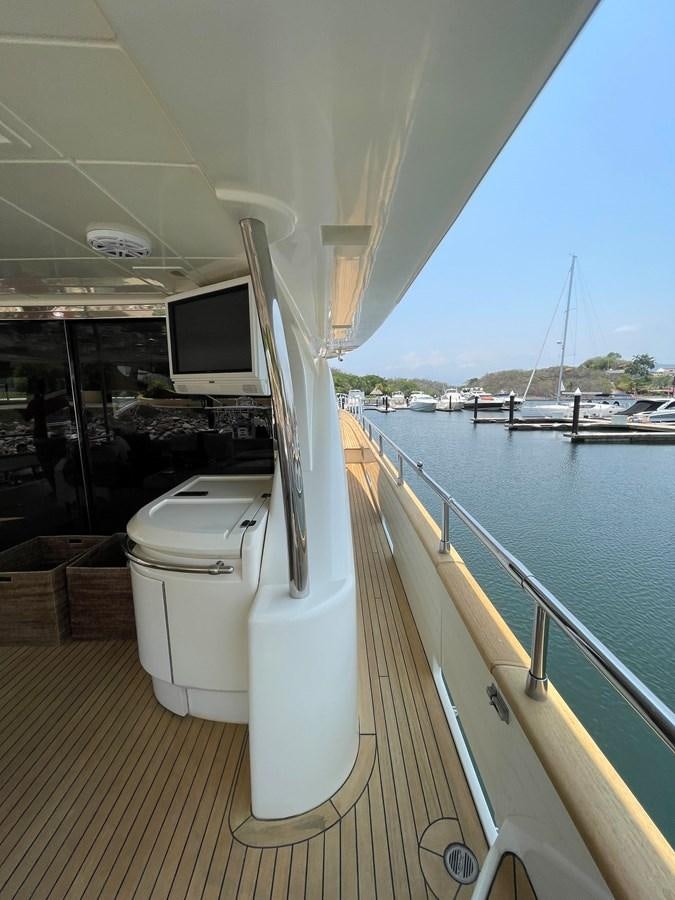 a boat on a deck aboard 2008 AZIMUT 75 FLY @ IXTAPA ZIHUATANEJO Yacht for Sale