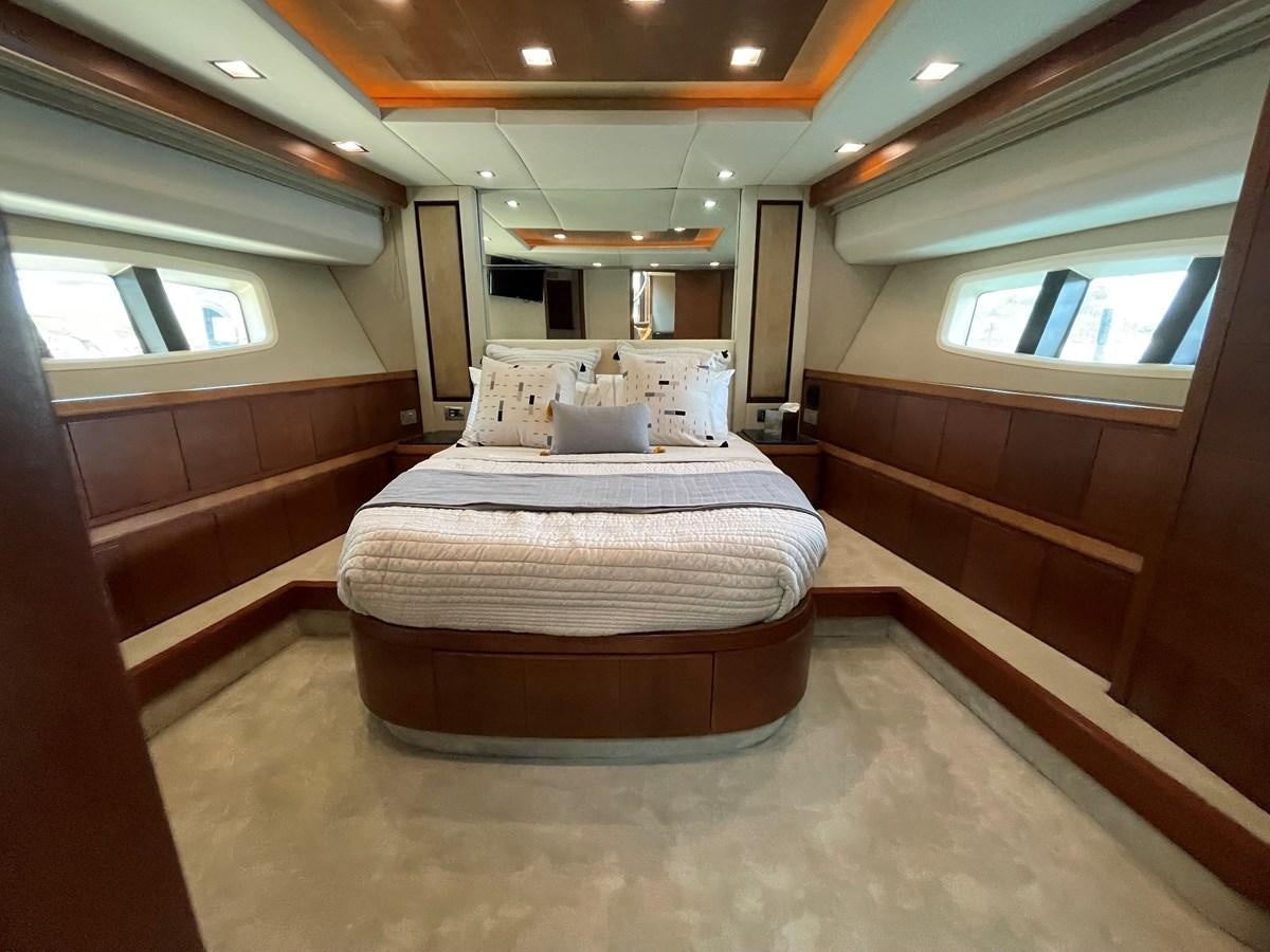 a bed in a room aboard 2008 AZIMUT 75 FLY @ IXTAPA ZIHUATANEJO Yacht for Sale