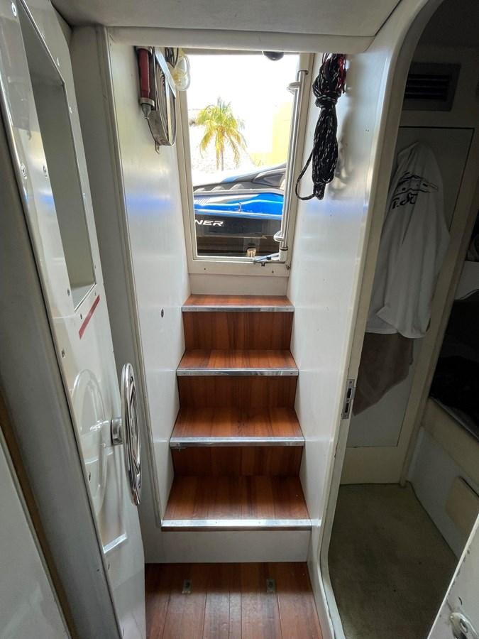 a door with a window aboard 2008 AZIMUT 75 FLY @ IXTAPA ZIHUATANEJO Yacht for Sale