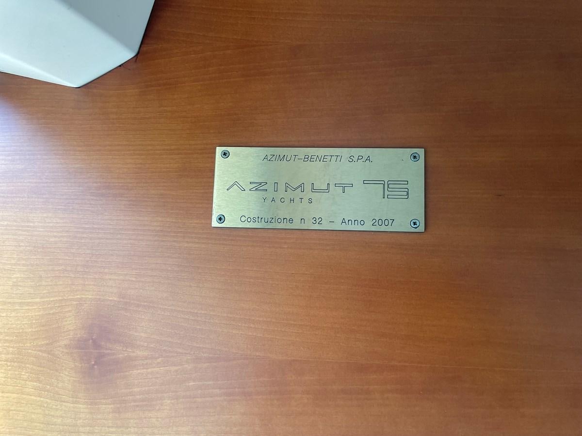 a small white box on a wood surface aboard 2008 AZIMUT 75 FLY @ IXTAPA ZIHUATANEJO Yacht for Sale