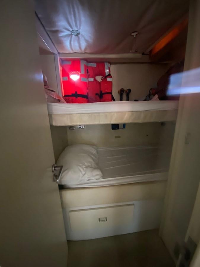 a white cabinet with a red light aboard 2008 AZIMUT 75 FLY @ IXTAPA ZIHUATANEJO Yacht for Sale