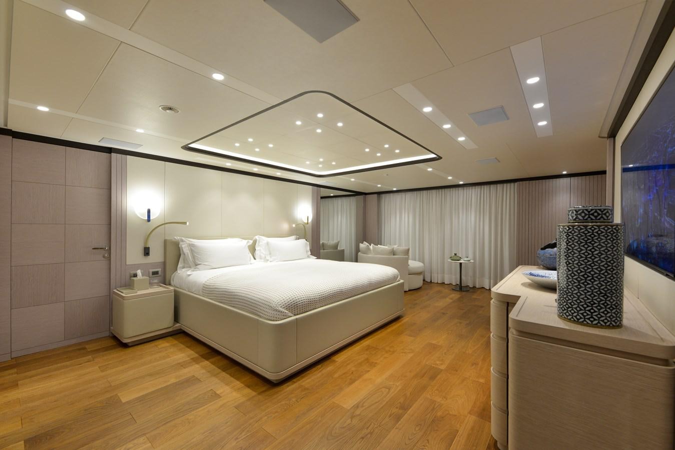 a large room with a bed and a large ceiling aboard MINE GAMES Yacht for Sale