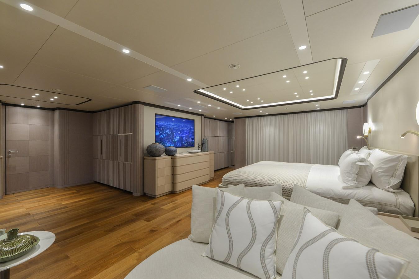 a room with a bed and a tv aboard MINE GAMES Yacht for Sale
