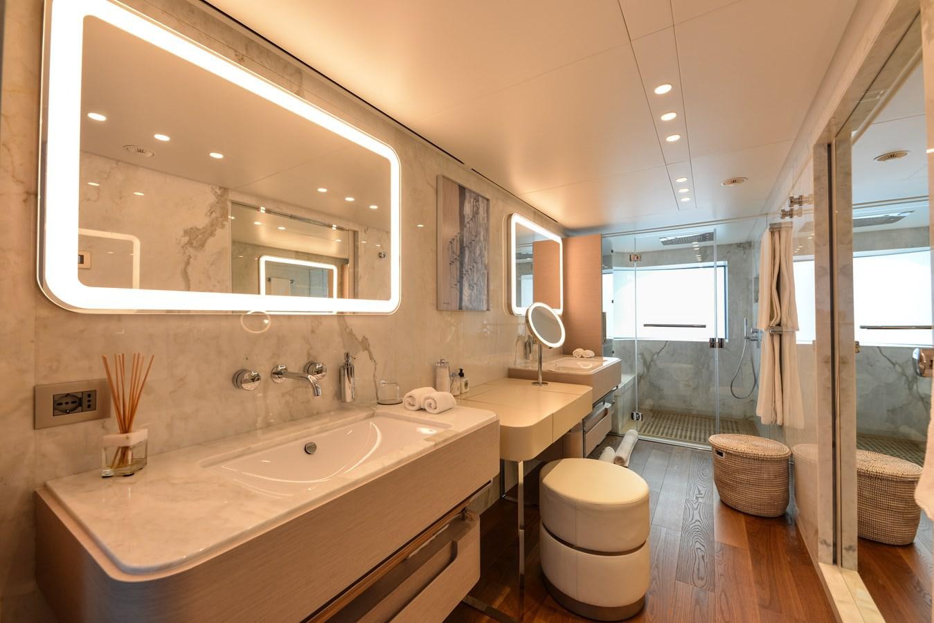 a bathroom with a large mirror aboard MINE GAMES Yacht for Sale