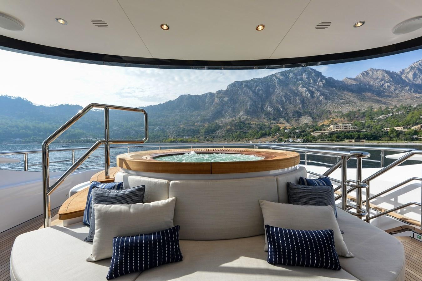 a large bed on a boat aboard MINE GAMES Yacht for Sale
