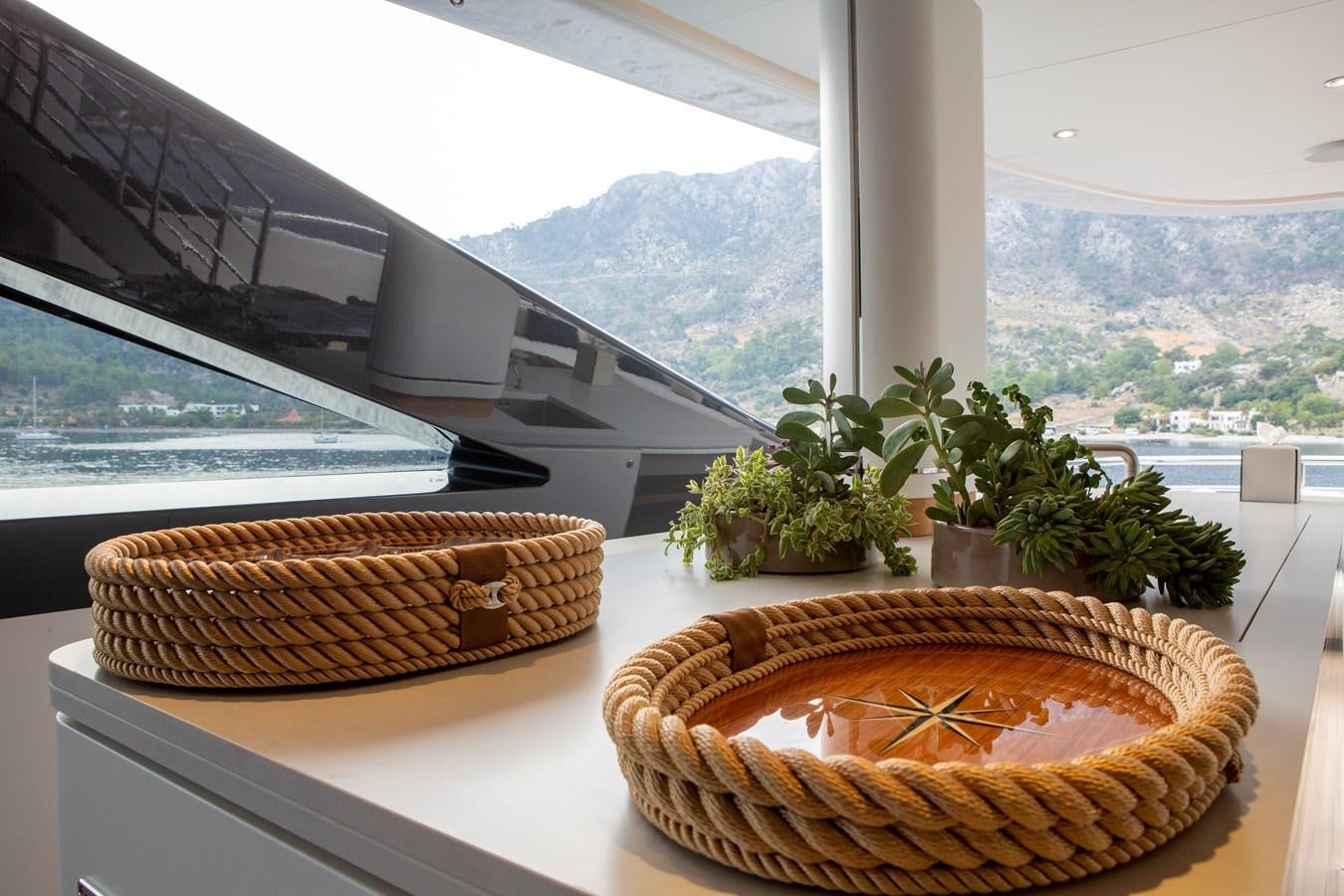a couple of baskets on a table aboard MINE GAMES Yacht for Sale