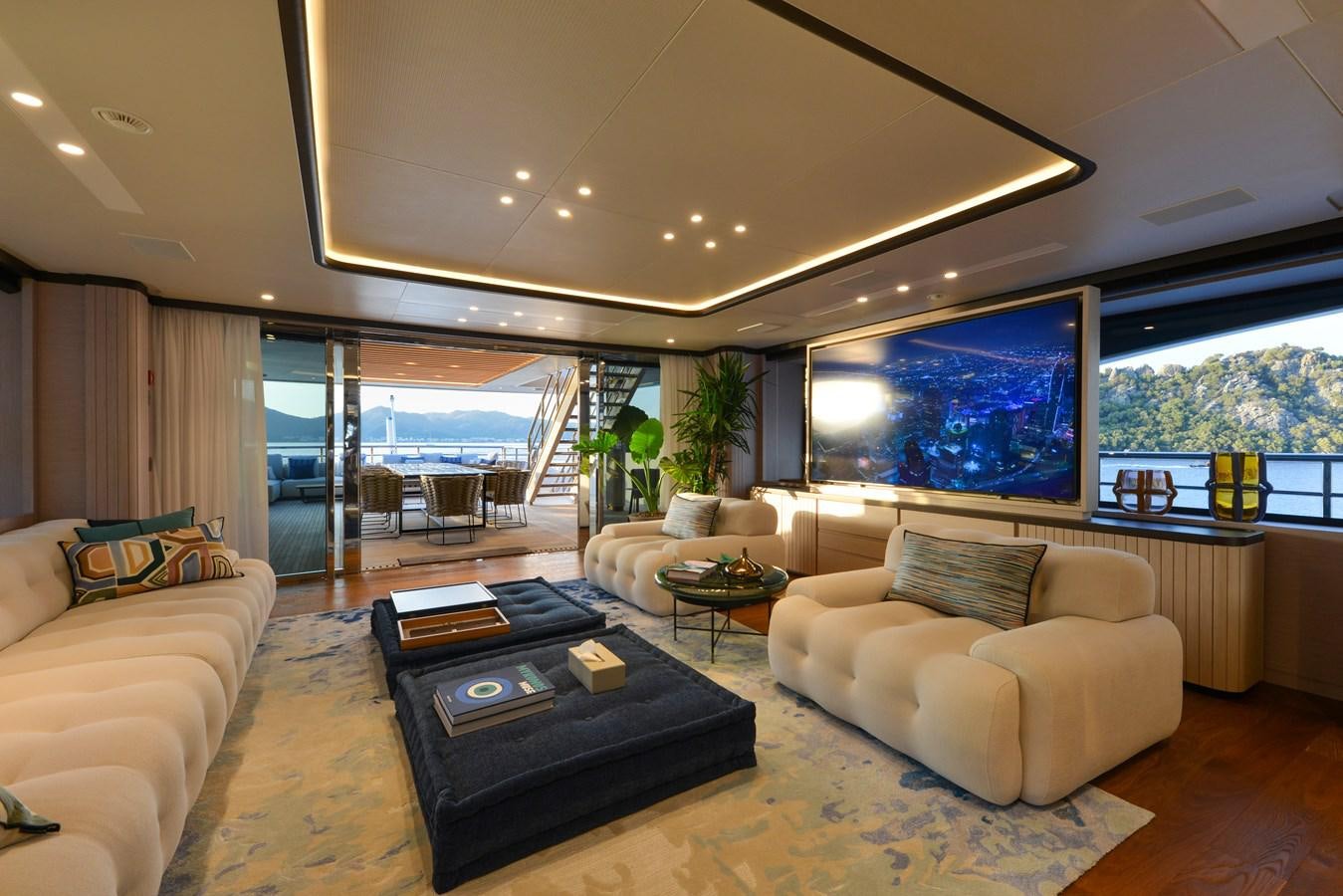a living room with a large window aboard MINE GAMES Yacht for Sale