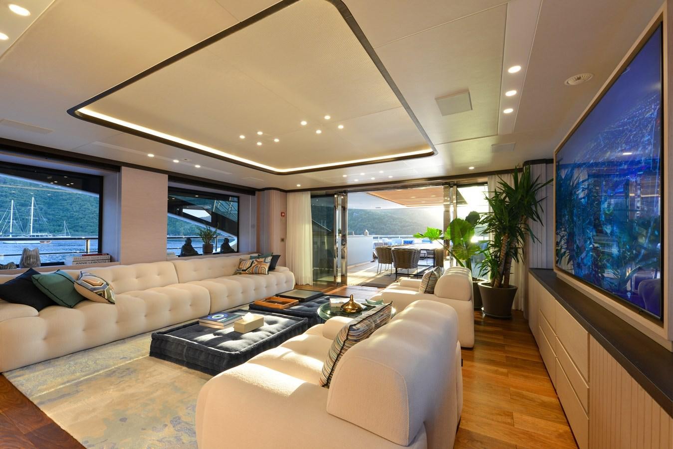 a living room with a large window aboard MINE GAMES Yacht for Sale