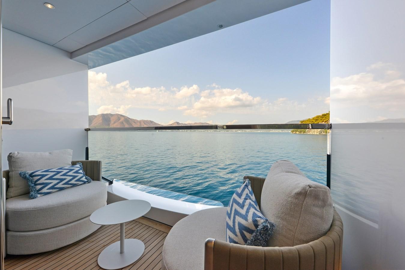 a large white boat on a body of water aboard MINE GAMES Yacht for Sale