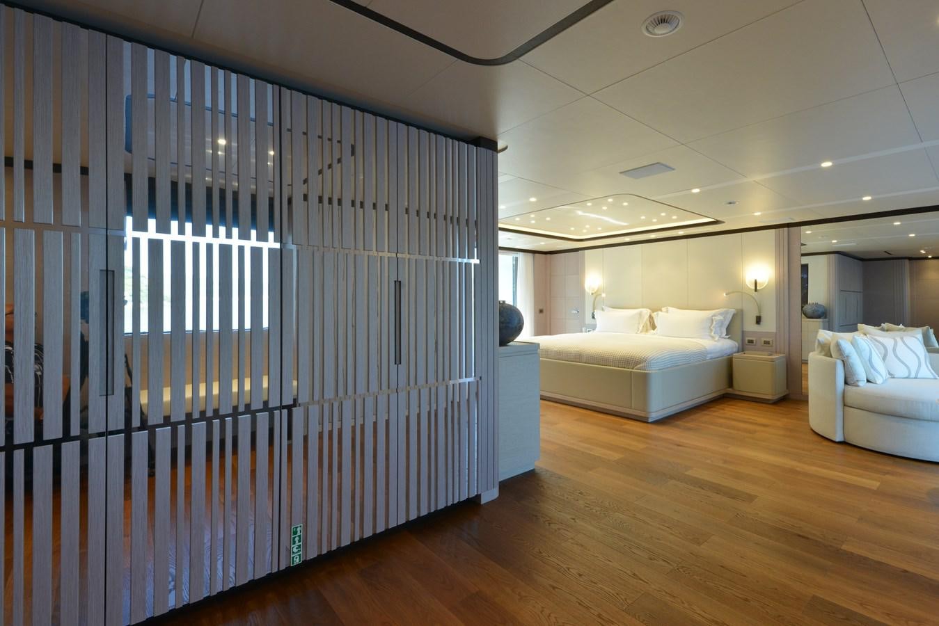 a room with a bed and a window aboard MINE GAMES Yacht for Sale