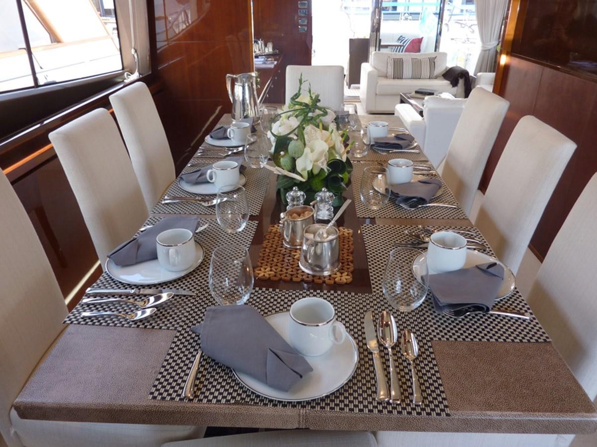 a table with silverware and silverware on it aboard WATCHIT Yacht for Sale