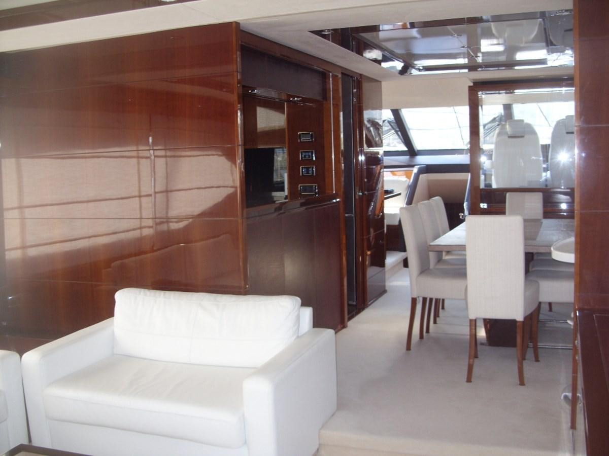 a room with a table and chairs aboard WATCHIT Yacht for Sale
