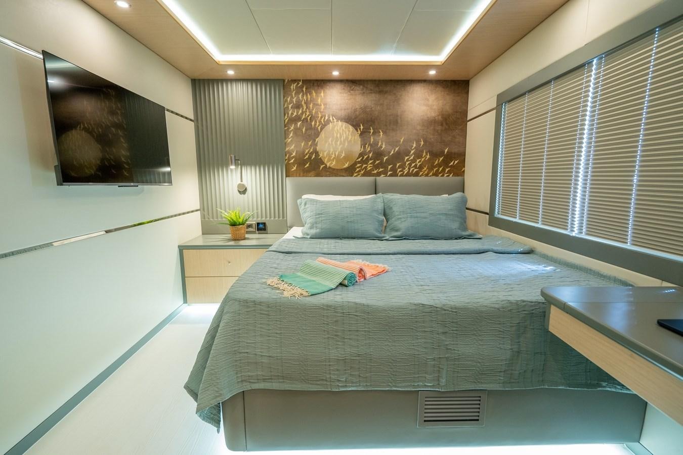 a bed in a room aboard LAVIN Yacht for Sale