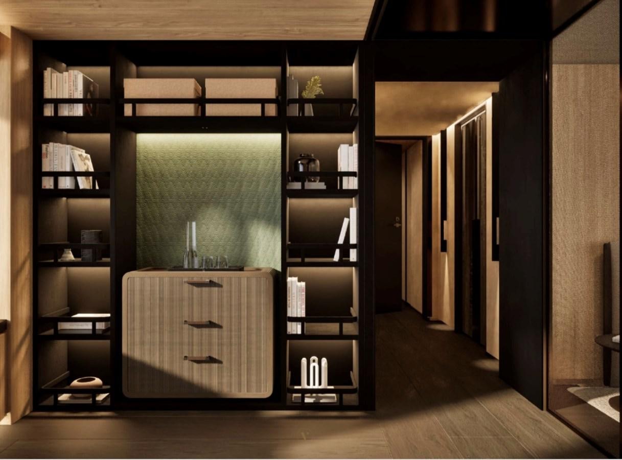 a room with shelves and a cabinet aboard PROJECT ICE Yacht for Sale
