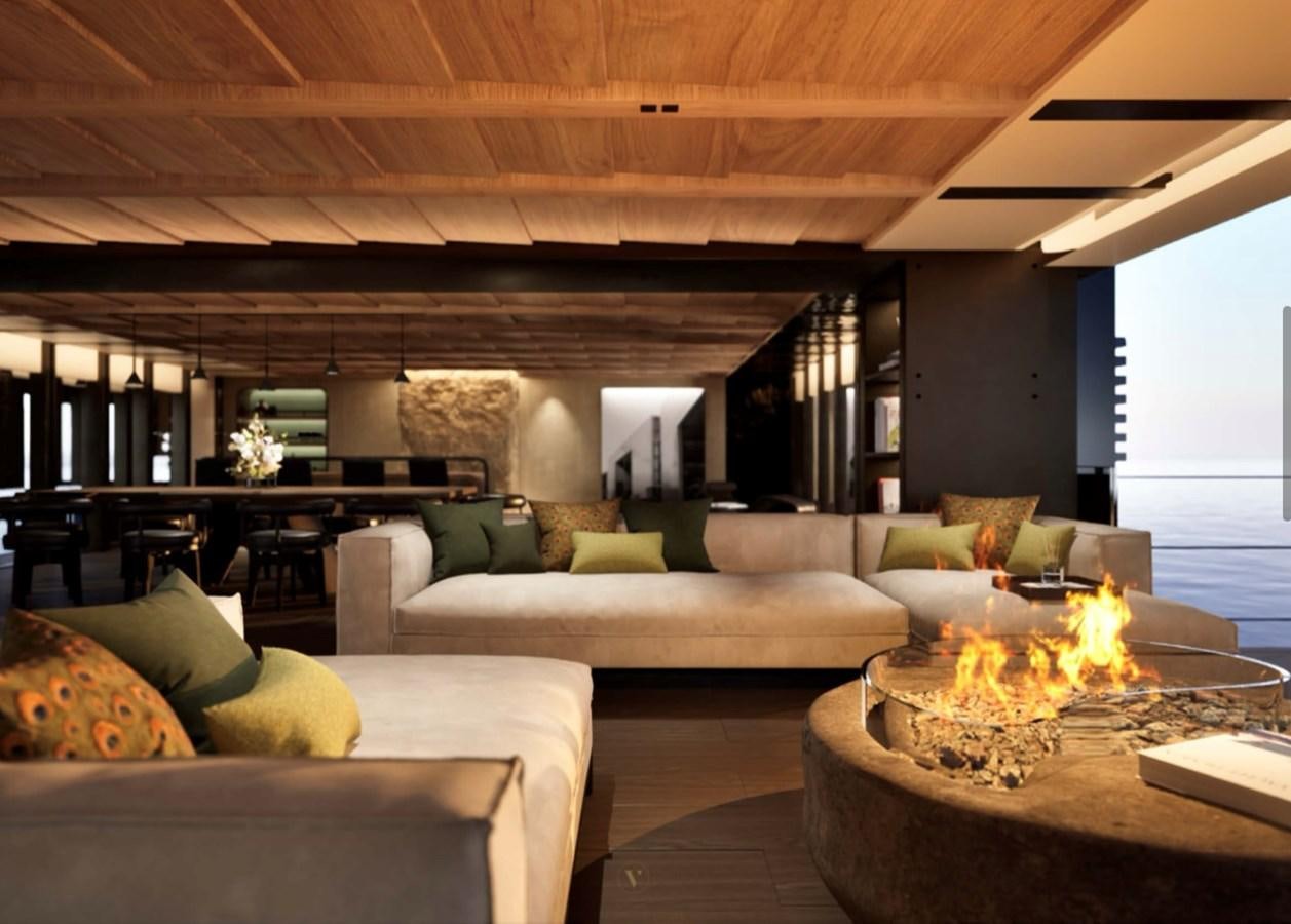 a living room with a fireplace aboard PROJECT ICE Yacht for Sale