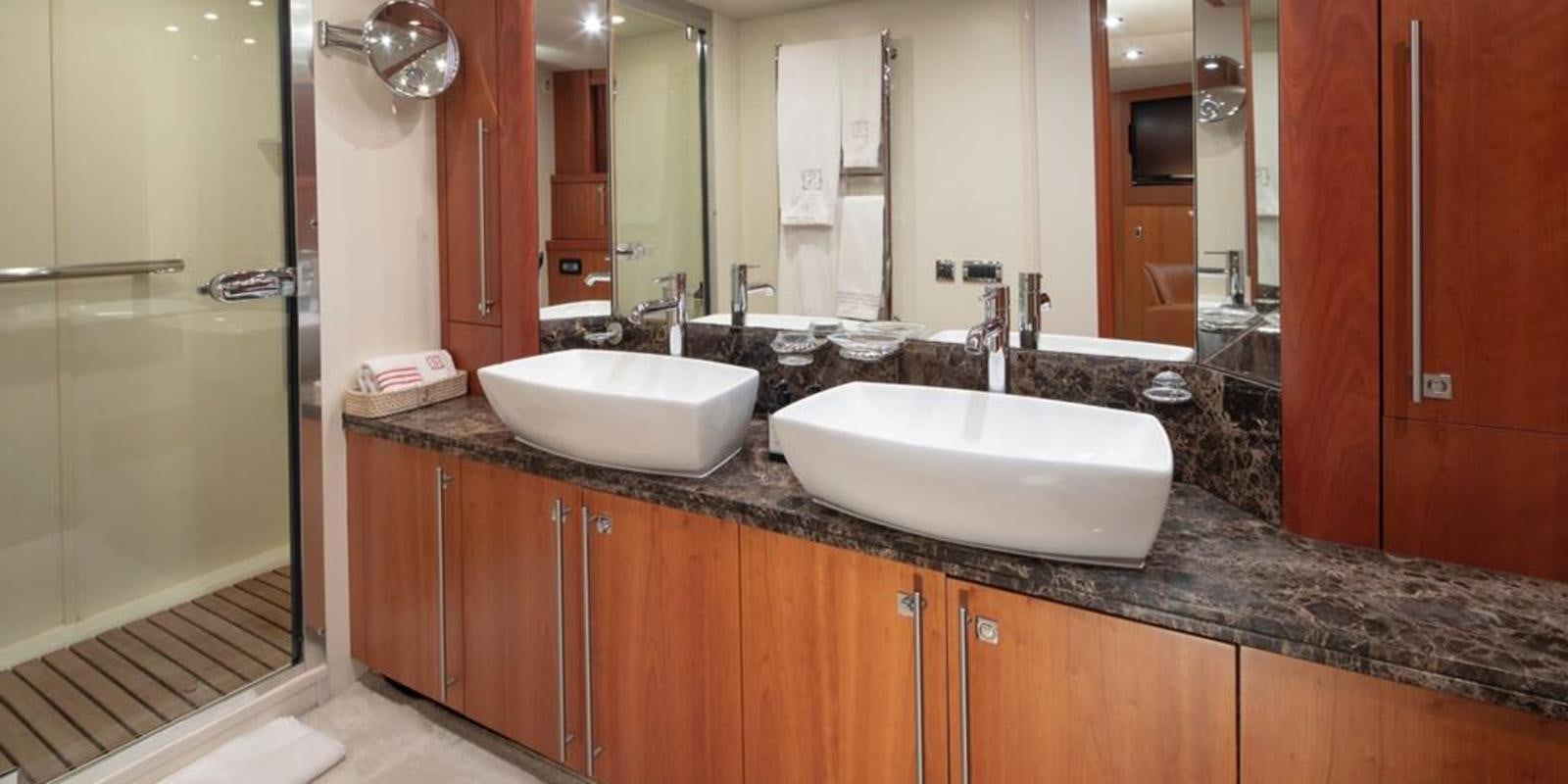 a bathroom with two sinks aboard SWORDFISH 68 Yacht for Sale