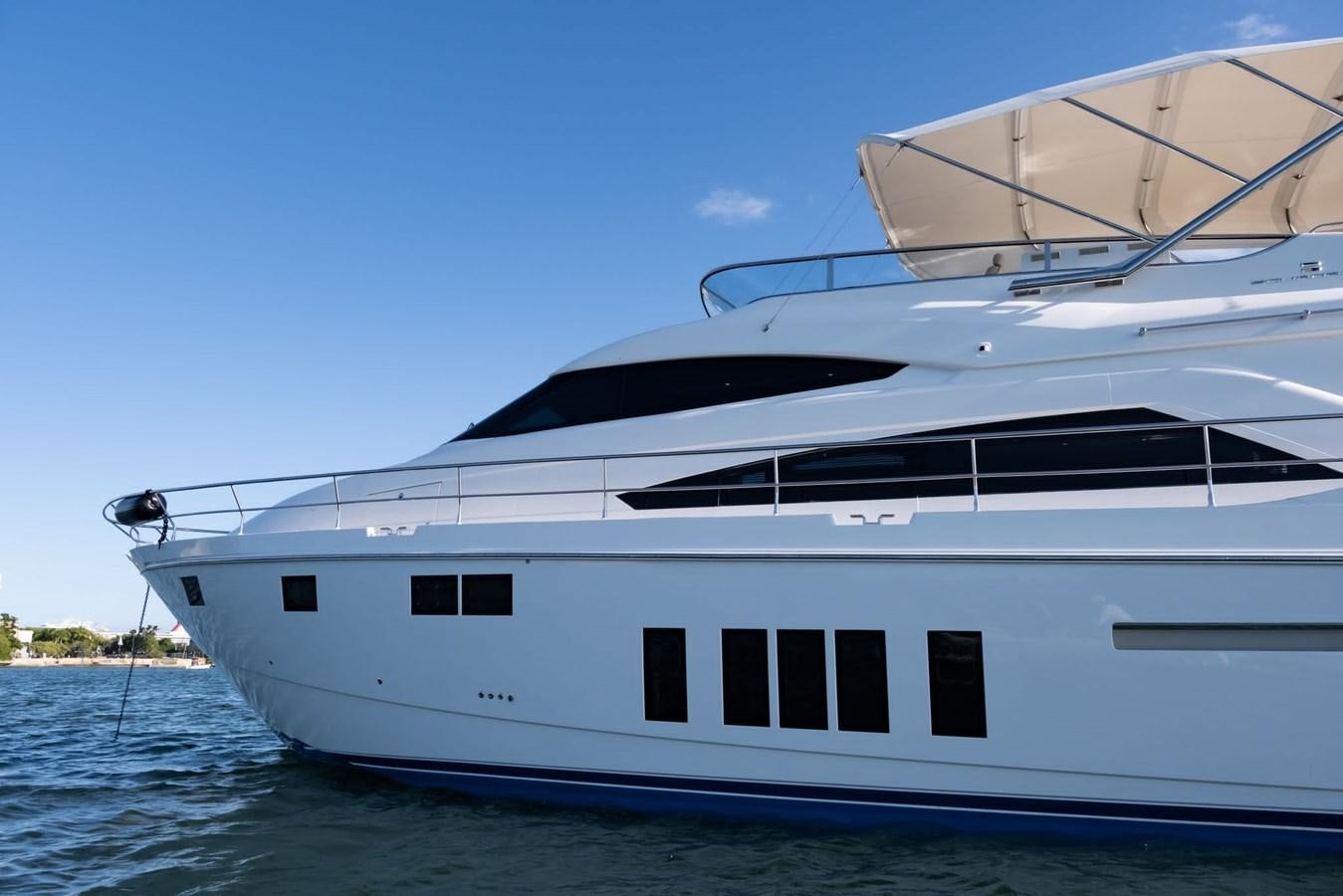 a white yacht on the water aboard SEA CHANGE Yacht for Sale