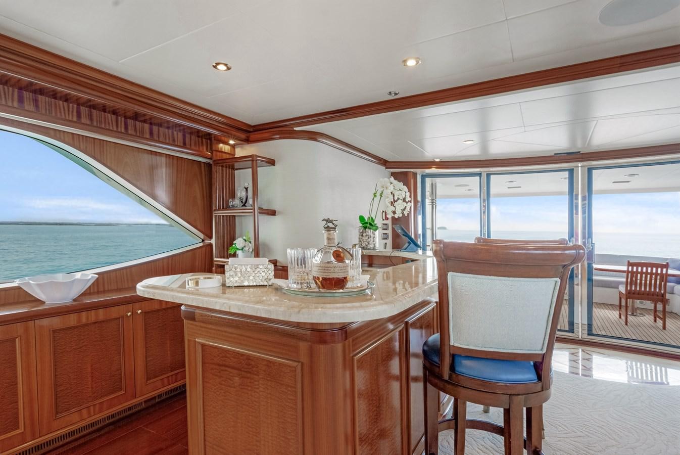 a kitchen with a table and chairs aboard MISS STEPHANIE Yacht for Sale
