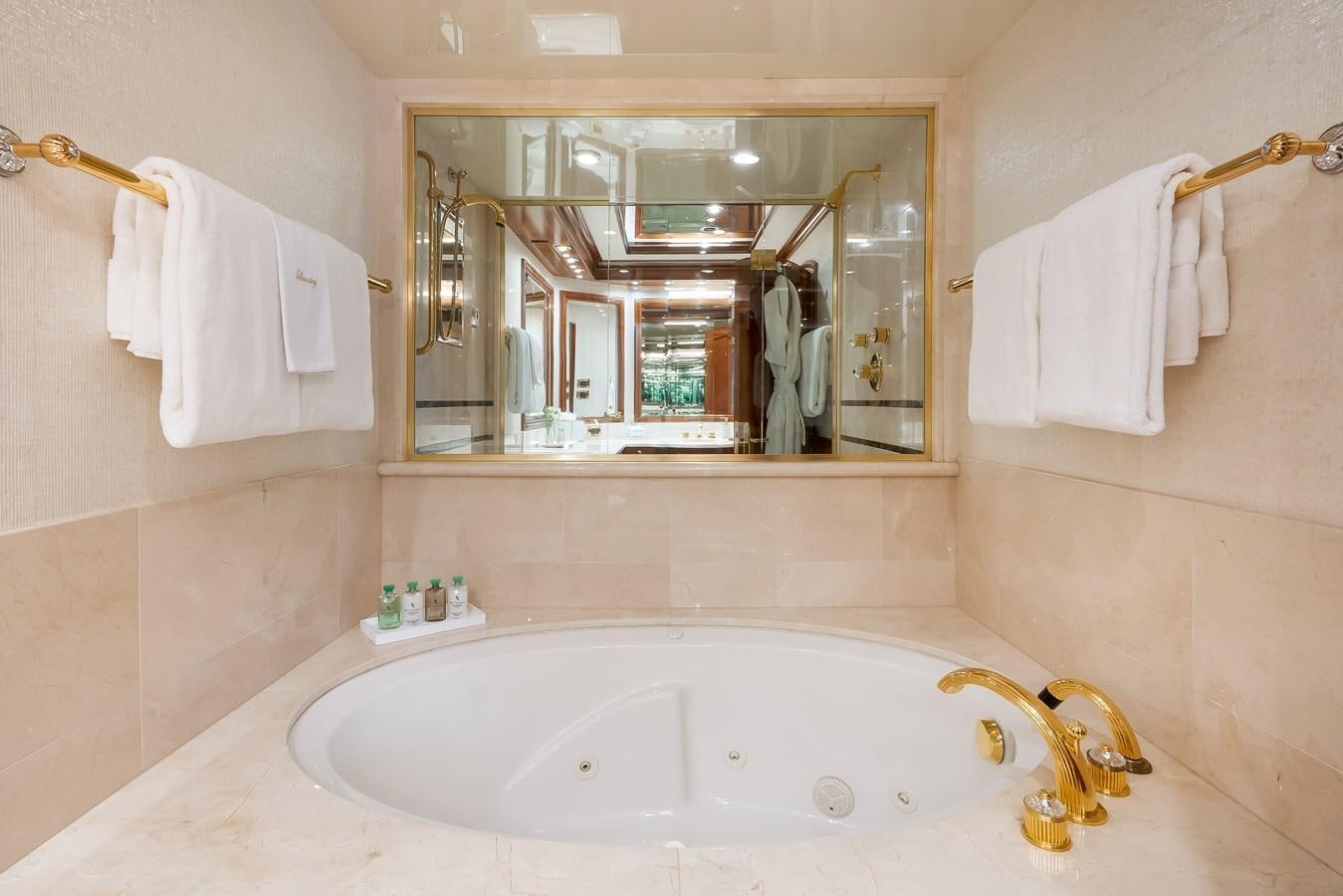 a bathroom with a large mirror aboard MISS STEPHANIE Yacht for Sale