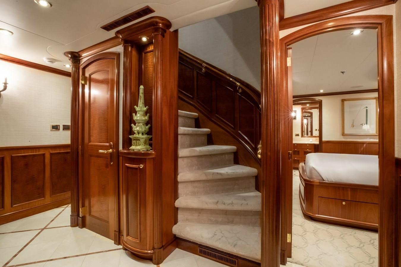 a room with a bed and a mirror aboard MISS STEPHANIE Yacht for Sale