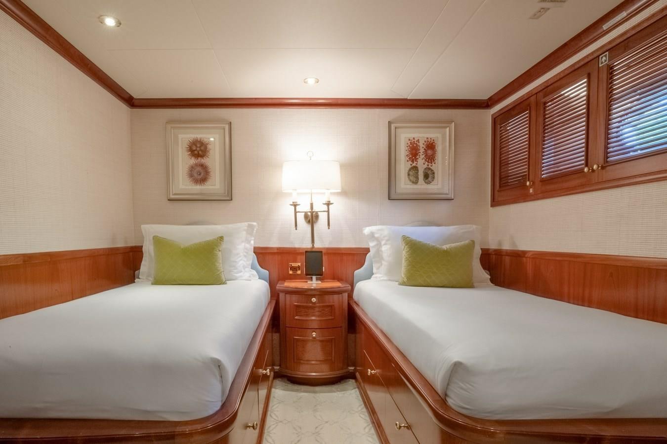 a couple of beds in a hotel room aboard MISS STEPHANIE Yacht for Sale