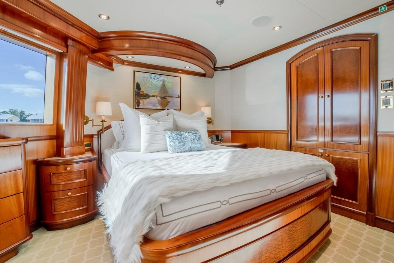 a large bed in a room aboard MISS STEPHANIE Yacht for Sale