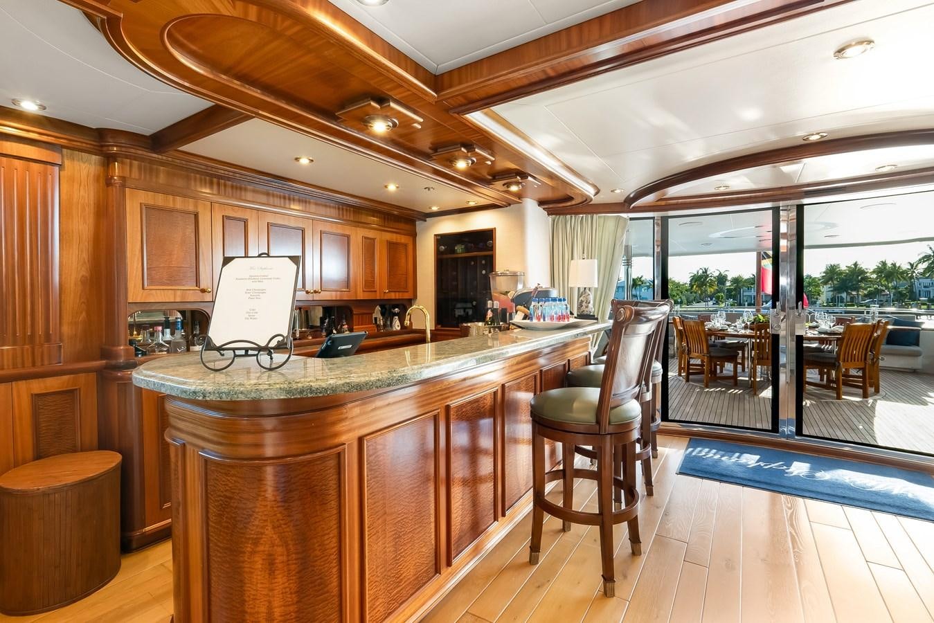 a kitchen with a bar and bar aboard MISS STEPHANIE Yacht for Sale