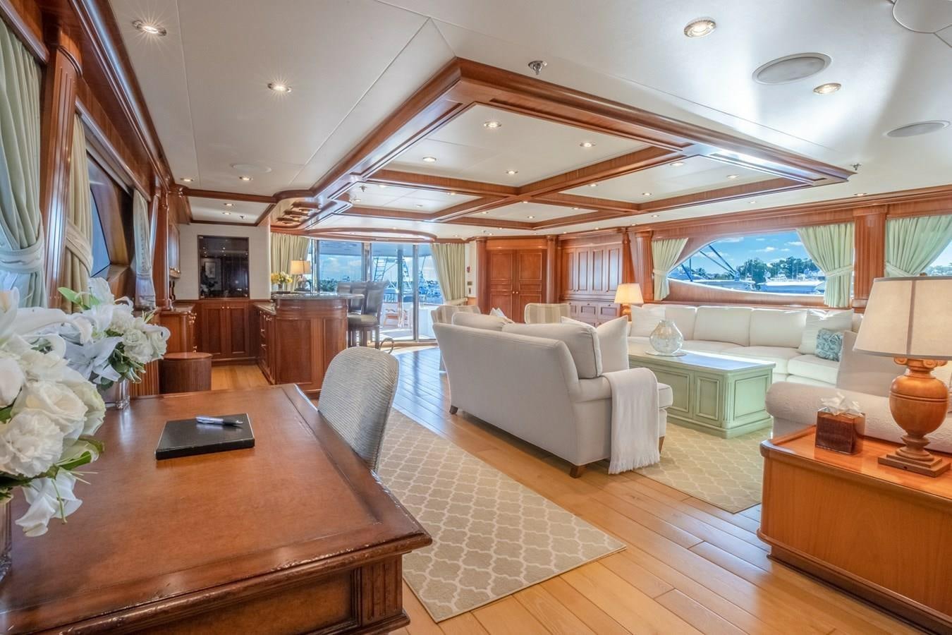 a living room with a large window aboard MISS STEPHANIE Yacht for Sale
