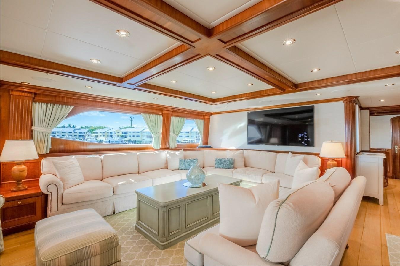 a living room with a large window aboard MISS STEPHANIE Yacht for Sale