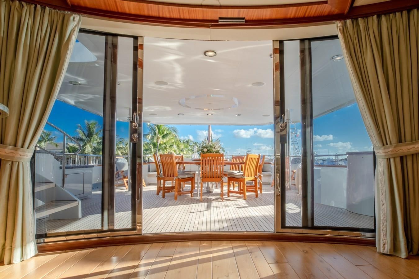 a room with a view of the ocean and the outside aboard MISS STEPHANIE Yacht for Sale