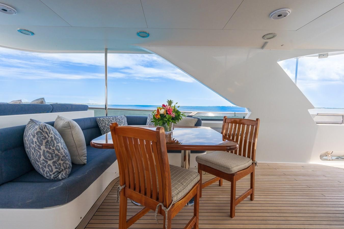 a table and chairs on a boat aboard MISS STEPHANIE Yacht for Sale