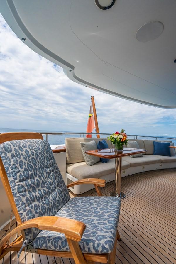 a room with a table and chairs aboard MISS STEPHANIE Yacht for Sale